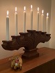 Large, heavy, seven-armed candlestick carved in 
solid teak, presumably Swedish. Mid century 
modern. 66 centimeters long, weighs 2.7 kilos