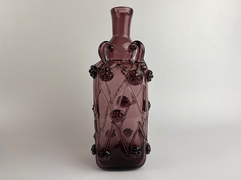 Beautiful old purple glass bottle / vase with glass threads and rosettes