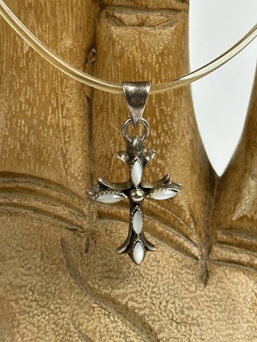 Vintage silver cross with transparent natural rubber "chain" and silver clasp.