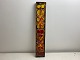 Relief / wall hanging plaque decor from Tilgman's 
pottery in Sweden. Red, yellow, orange and brown 
colors.