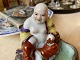 Little Chinese, smiling Buddha / Budai / porcelain 
figurine - happy Buddha