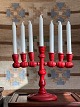 Swedish arts and craft (folk art) seven-armed 
candlestick / Christmas candlestick. Turned wood 
with red paint