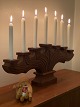 Large, heavy, seven-armed candlestick carved in solid teak, presumably Swedish. 
Mid century modern. 66 centimeters long, weighs 2.7 kilos