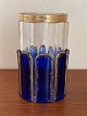 Antique vase of panel-cut crystal in cobalt blue 
and clear glass with gildings and faint floral 
pattern, in the style of Moser, 19.-20. century