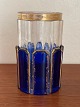 Antique vase of panel-cut crystal in cobalt blue and clear glass with gildings 
and faint floral pattern, in the style of Moser, 19.-20. century