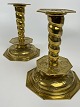 Pair of beautiful octagonal candlesticks, baroque 
form, brass with flowers and leaves in tendrils