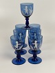 Mary Gregory cobalt blue wine glass, set of 7 glasses with motifs of boy, girl 
and birds in landscape