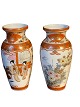 Pair of Japanese Kutani vases, decorated in orange 
and gold