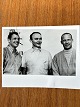 NASA: Small original black and white photograph of the three Apollo 11 
astronauts Neil Armstrong, Mike Collins and Edwin Aldrin, gelatin silver, July 
1969 with the Apollo V rocket in the background